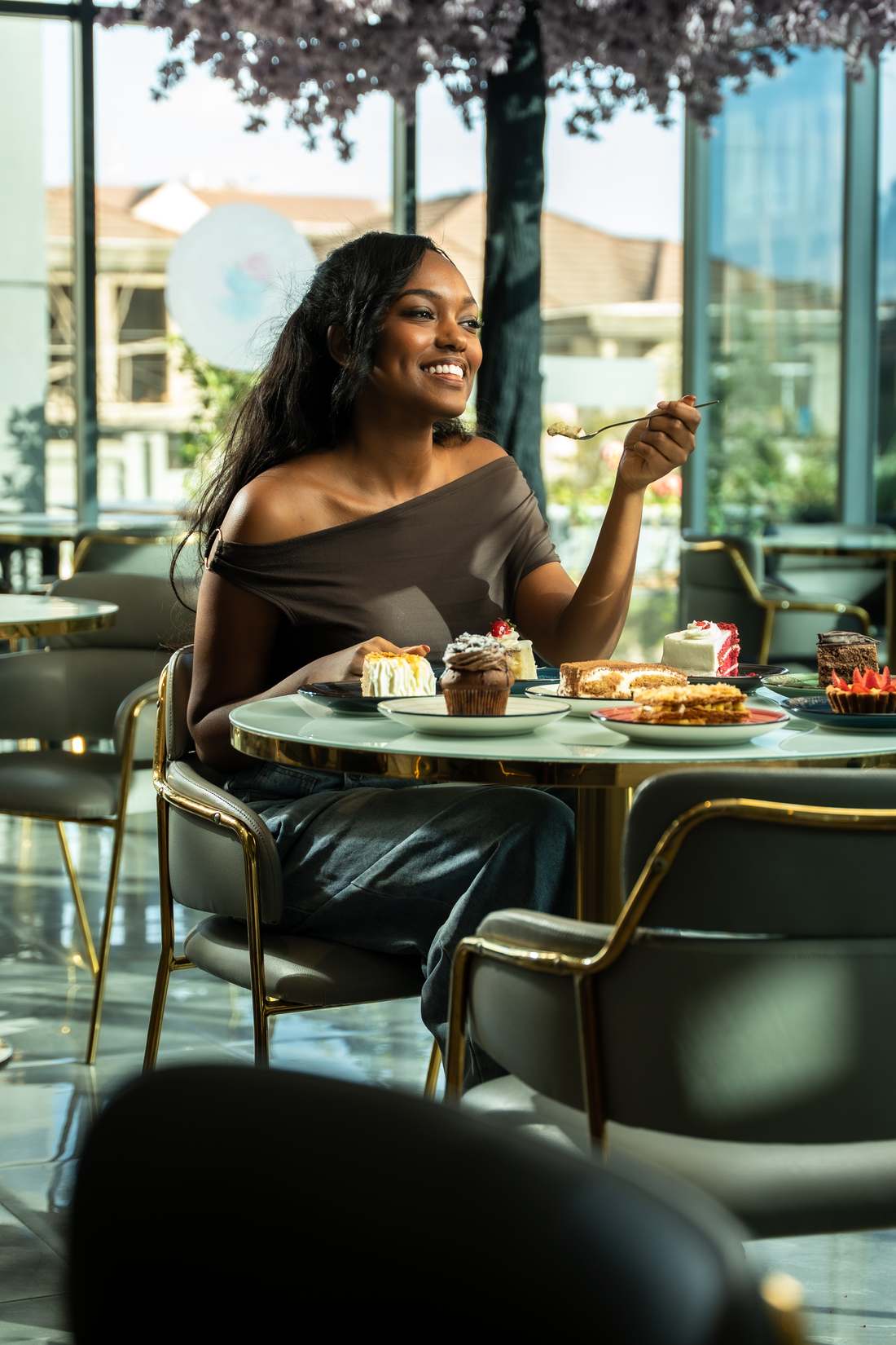 Guest enjoying desserts at La Vie En Rose